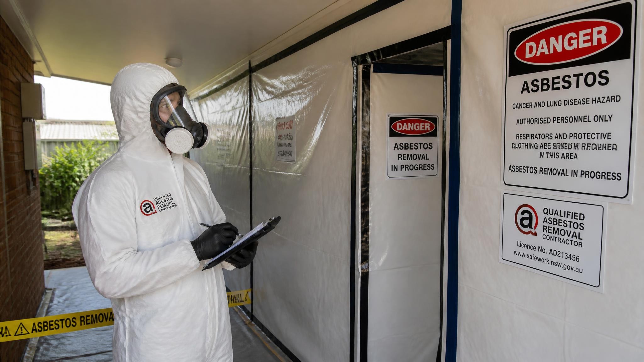 Licenced asbestos contractor inspecting a work site