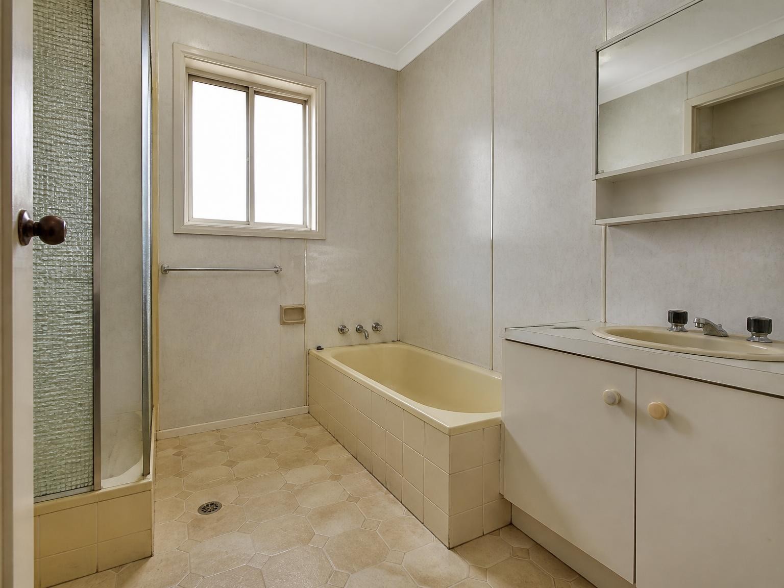 Older bathroom that may contain asbestos materials