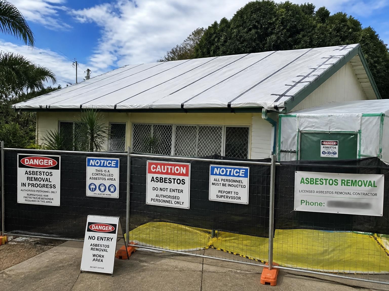 Asbestos roof sheets prepared for controlled removal