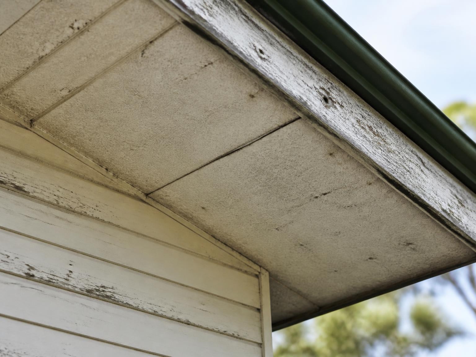 Asbestos cement eaves and soffit lining